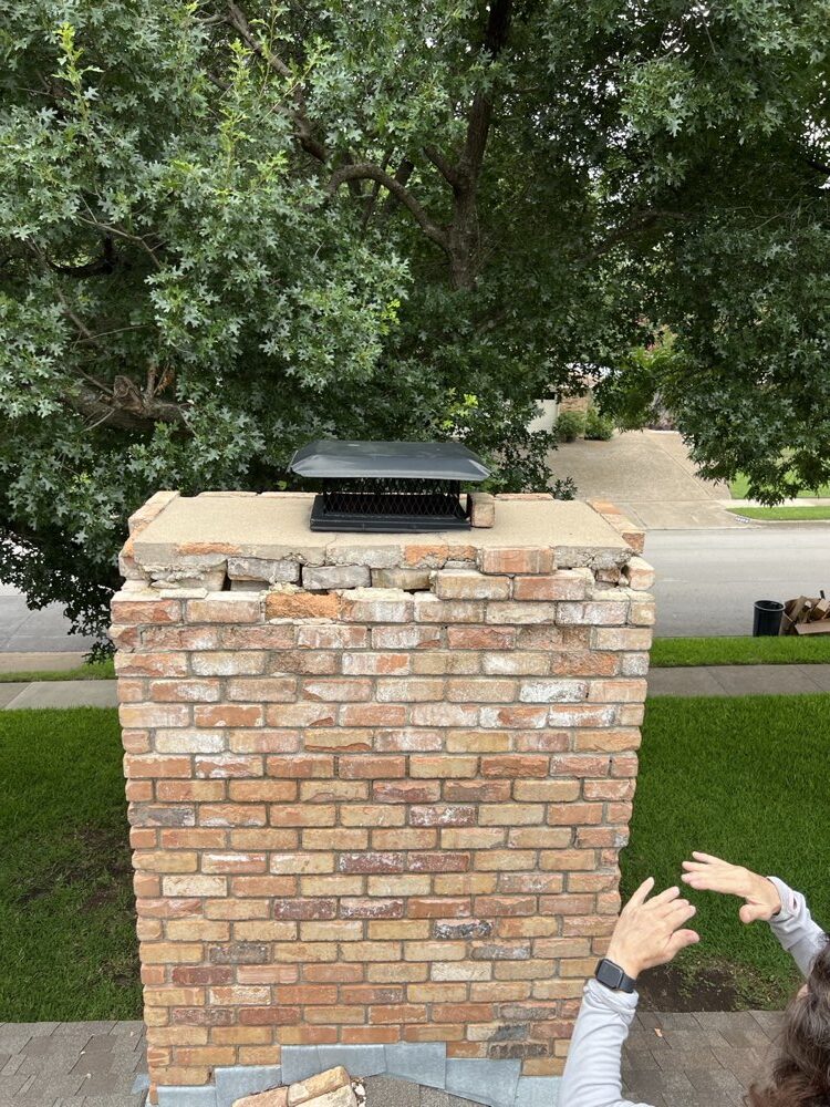 Completed rebuilt chimney above the roofline