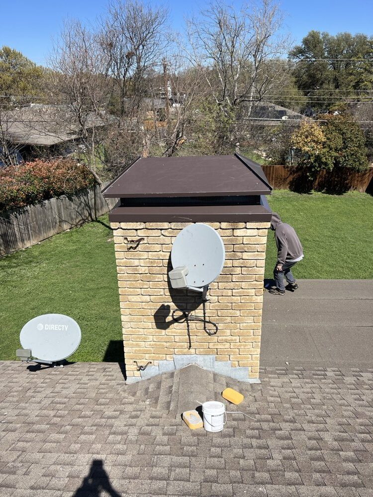 New stainless chimney cap installed on the flue