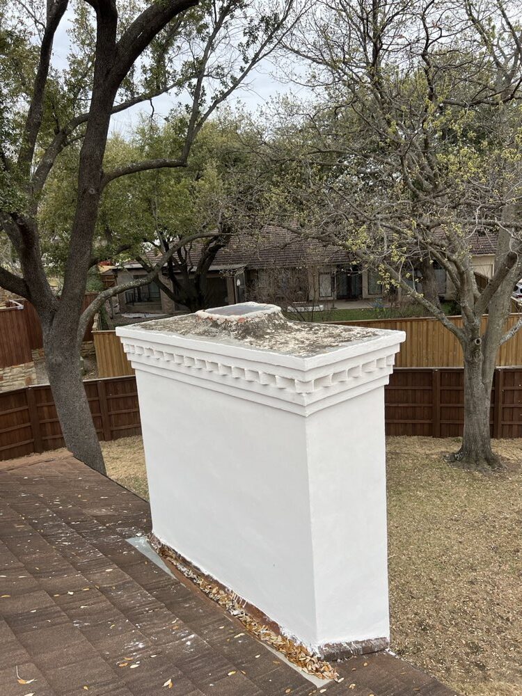 Completed custom cap on a brick chimney